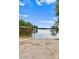Sandy beach and tranquil lake view at 18304 Rosapenny Rd, Charlotte, NC 28278