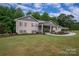 Ranch style home with covered porch and landscaped yard at 213 Press Sweezy Rd, Kings Mountain, NC 28086