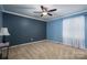 Spacious bedroom with neutral walls, carpet, and ceiling fan at 213 Press Sweezy Rd, Kings Mountain, NC 28086