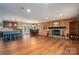 Open concept kitchen, dining, and living area with hardwood floors at 213 Press Sweezy Rd, Kings Mountain, NC 28086
