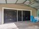 Garage with retractable screen, perfect for outdoor entertaining at 213 Press Sweezy Rd, Kings Mountain, NC 28086