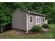 Detached storage shed with double doors and ramp access at 213 Press Sweezy Rd, Kings Mountain, NC 28086
