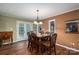 Charming dining room adjacent to the kitchen with hardwood floors at 213 Press Sweezy Rd, Kings Mountain, NC 28086