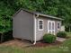 Detached storage shed with double doors and ramp access at 213 Press Sweezy Rd, Kings Mountain, NC 28086