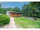 Brick walkway leads to a detached garage and workshop at 2501 Twin Ave, Gastonia, NC 28052