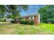 Brick ranch house with a large yard and shed at 2501 Twin Ave, Gastonia, NC 28052