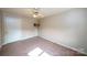 Bedroom with ceiling fan and carpet at 2501 Twin Ave, Gastonia, NC 28052