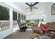 Relaxing screened porch with wicker furniture at 2501 Twin Ave, Gastonia, NC 28052