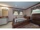 Bathroom with built-in bathtub and wooden vanity at 2501 Twin Ave, Gastonia, NC 28052
