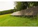 Solar panel array in a grassy field, providing clean energy at 44097 Nc 740 Hwy, New London, NC 28127