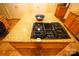 Kitchen island with gas cooktop and granite countertop at 44097 Nc 740 Hwy, New London, NC 28127