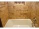 Clean bathroom with tiled shower/tub combo and grab bar at 44097 Nc 740 Hwy, New London, NC 28127