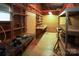 Workshop with pegboard walls and built-in shelving at 44097 Nc 740 Hwy, New London, NC 28127