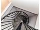 Modern spiral staircase leading to upper level at 3245 Jackson Rd, Mooresville, NC 28115
