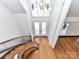 High ceiling entryway with double doors and curved staircase at 3245 Jackson Rd, Mooresville, NC 28115