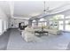 Relaxing game room featuring comfortable seating and access to outdoor views at 3245 Jackson Rd, Mooresville, NC 28115