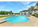 Inviting kidney-shaped pool with diving board and fire pit at 3245 Jackson Rd, Mooresville, NC 28115