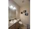 Clean bathroom with a single sink vanity and toilet at 1376 21St Ne Ave, Hickory, NC 28601