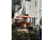 Private patio with brick wall, umbrella, and seating at 1376 21St Ne Ave, Hickory, NC 28601