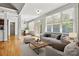 Gathering room with hardwood floors, a cozy sitting area, and access to a patio at 2504 Stoneview Ct, Denver, NC 28037