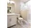 White subway tile shower and hexagon floor tile at 205 Water Oak Way, Mount Gilead, NC 27306