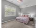 Bedroom with full bed and window at 2309 River Oaks Dr, Waxhaw, NC 28173