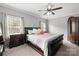 Spacious bedroom with a ceiling fan and built-in wardrobe at 2309 River Oaks Dr, Waxhaw, NC 28173