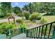 Charming backyard with garden and steps leading to a deck at 1099 4Th Avenue Nw Dr, Hickory, NC 28601