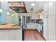 Bright kitchen featuring custom cabinetry, stainless steel appliances, and hardwood floors at 1099 4Th Avenue Nw Dr, Hickory, NC 28601