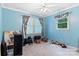 Bedroom with light-blue walls, carpet, and large window at 1099 4Th Avenue Nw Dr, Hickory, NC 28601