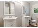 Bathroom with double vanity and white cabinets at 1099 4Th Avenue Nw Dr, Hickory, NC 28601