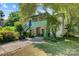 Two-story house with green accents and landscaped yard at 1099 4Th Avenue Nw Dr, Hickory, NC 28601