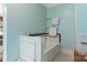 Bathroom with built-in bathtub and light-blue walls at 1099 4Th Avenue Nw Dr, Hickory, NC 28601