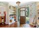 Bright entryway with hardwood floors and built-in shelving at 1099 4Th Avenue Nw Dr, Hickory, NC 28601