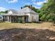 Older fixer-upper home with a screened porch and large yard at 407 Chester Ave, Great Falls, SC 29055