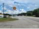 Roadside view of a highway with a gas station and other businesses at 407 Chester Ave, Great Falls, SC 29055