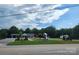 Roadside view of a bank, other businesses, and houses at 407 Chester Ave, Great Falls, SC 29055