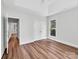 Bright bedroom featuring hardwood floors and double door closet at 620 St Lukes Church Rd, Salisbury, NC 28146