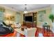 Relaxing sitting area with a fireplace, comfortable chairs and a large TV at 1008 Medinah Ct, Waxhaw, NC 28173