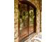 Double front doors with arched tops and decorative wreaths at 1008 Medinah Ct, Waxhaw, NC 28173