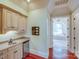 Convenient wet bar with granite countertop and mini-fridge at 1008 Medinah Ct, Waxhaw, NC 28173