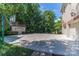 Private paved sport court with basketball goal and storage shed at 1008 Medinah Ct, Waxhaw, NC 28173