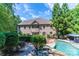 Brick house with a large backyard, pool and gazebo at 1008 Medinah Ct, Waxhaw, NC 28173