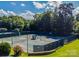 Two well-maintained tennis courts at 1008 Medinah Ct, Waxhaw, NC 28173
