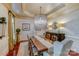 Formal dining room with chandelier and hardwood floors, seats eight comfortably at 1008 Medinah Ct, Waxhaw, NC 28173