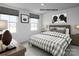 Cozy bedroom with a bed and gray and white bedding at 335 Maplestead St # 1112, Lancaster, SC 29720