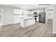 Modern kitchen with island, stainless steel appliances, and white cabinetry at 335 Maplestead St # 1112, Lancaster, SC 29720