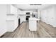 Modern kitchen with white cabinets and island at 335 Maplestead St # 1112, Lancaster, SC 29720