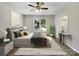 Virtually staged main bedroom with a ceiling fan at 2008 Sarn Ct, Gastonia, NC 28054