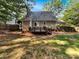 Back of house showing deck and private backyard at 2008 Sarn Ct, Gastonia, NC 28054
